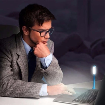 Eye care bendable USB LED reading light used on laptop keyboard for late night work in Sri Lanka